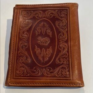Vintage leather hand-tooled tri-fold wallet 
Unisex